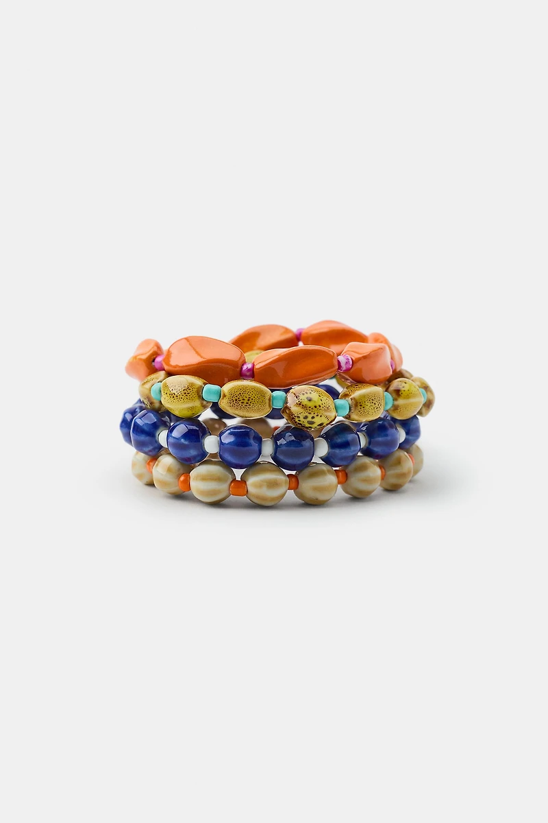 PACK OF 4 CERAMIC BEAD AND SHELL BRACELETS