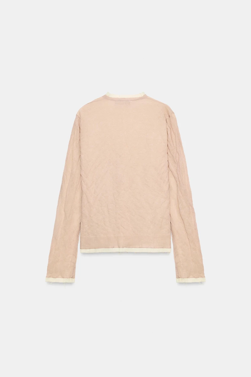 VESTE EN MAILLE AVEC LACETS