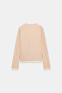 VESTE EN MAILLE AVEC LACETS