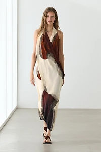 Long flowing halter neck dress