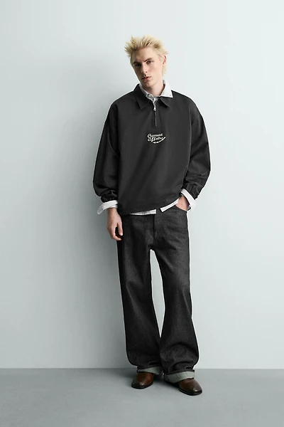 EMBROIDERED ZIP POLO SHIRT