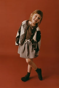 GILET EN MAILLE À LOSANGES