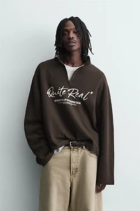 PRINTED QUARTER-ZIP SWEATSHIRT