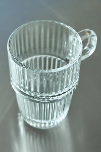 GLASS MUG WITH A RAISED DESIGN