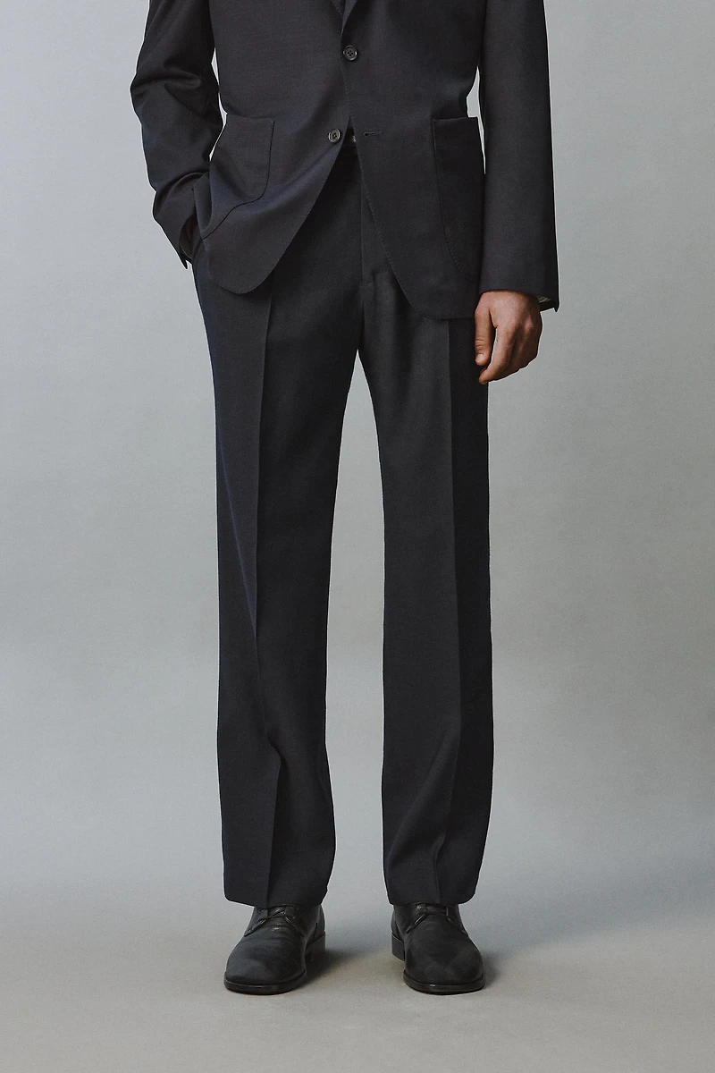 100% WOOL RELAXED FIT PLEATED PANTS