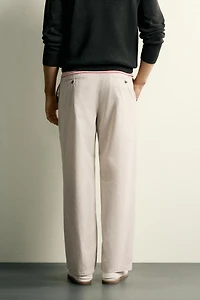 PLEATED STRAIGHT FIT CHINO PANTS