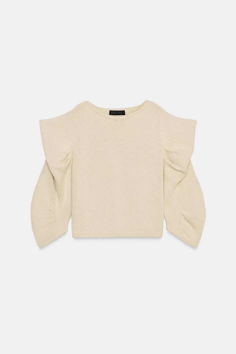 PULL EN MAILLE À MANCHES DRAPÉES