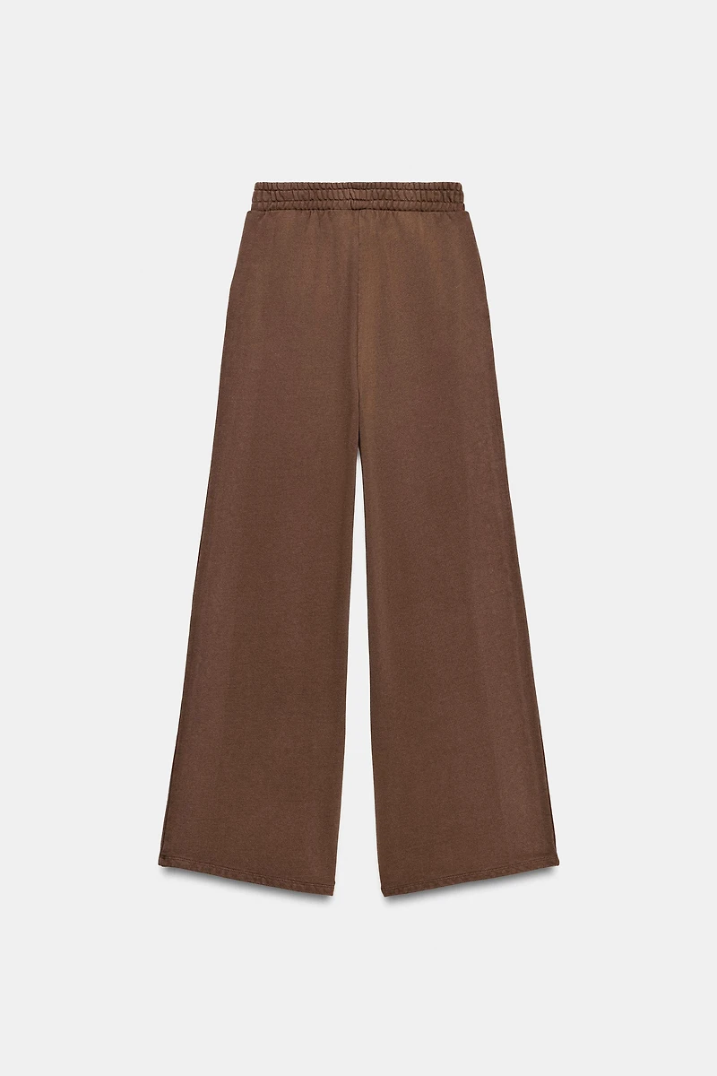 PANTALON EN MOLLETON EFFET DÉLAVÉ CLOUS