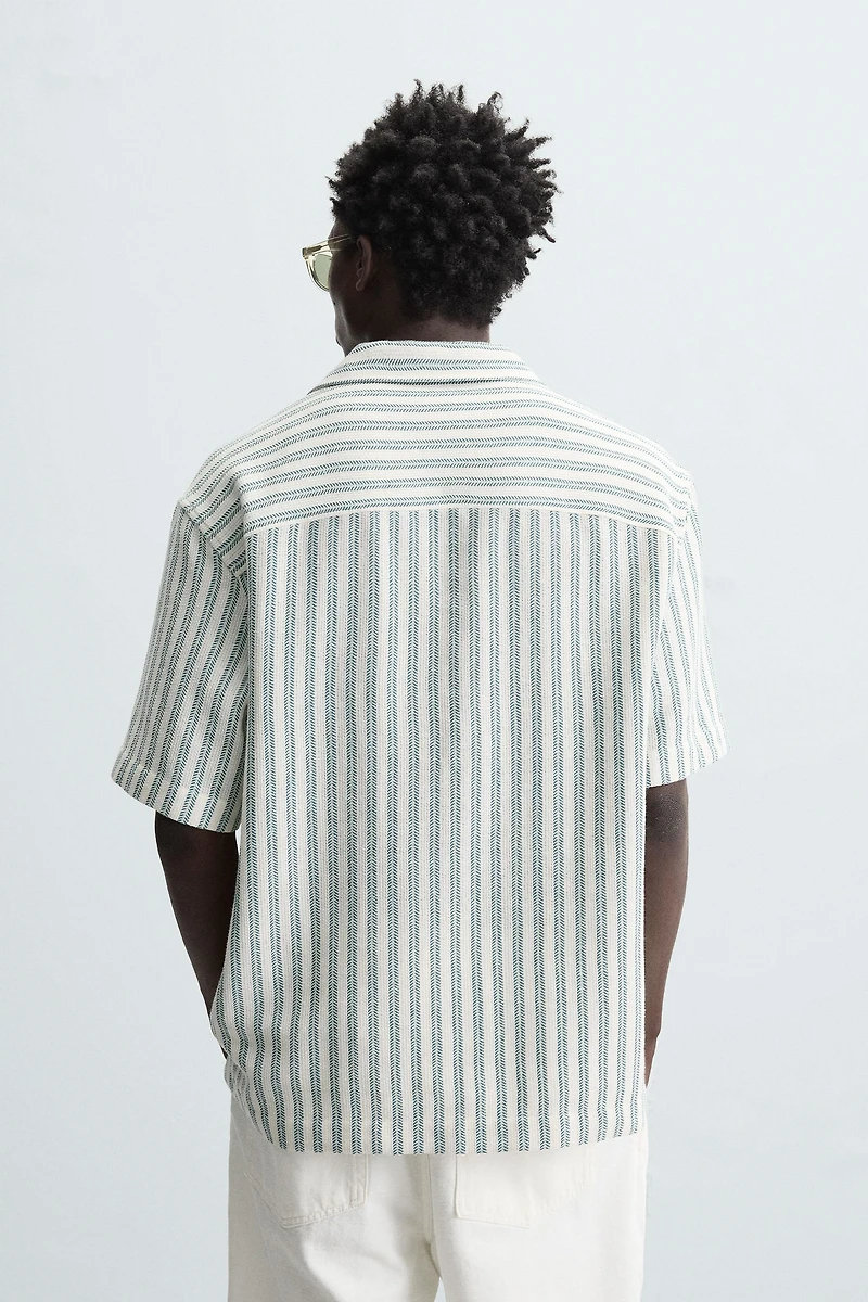 CHEMISE POLO STRUCTURÉE À CHEVRONS