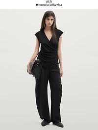 Metallic finish top with surplice neckline