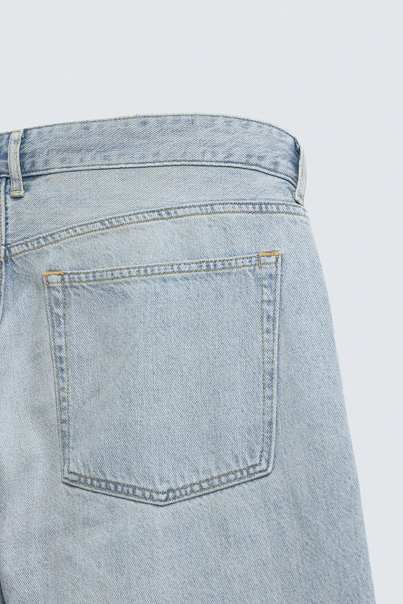 IRREGULAR HEM STRAIGHT FIT JEANS