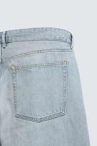 IRREGULAR HEM STRAIGHT FIT JEANS
