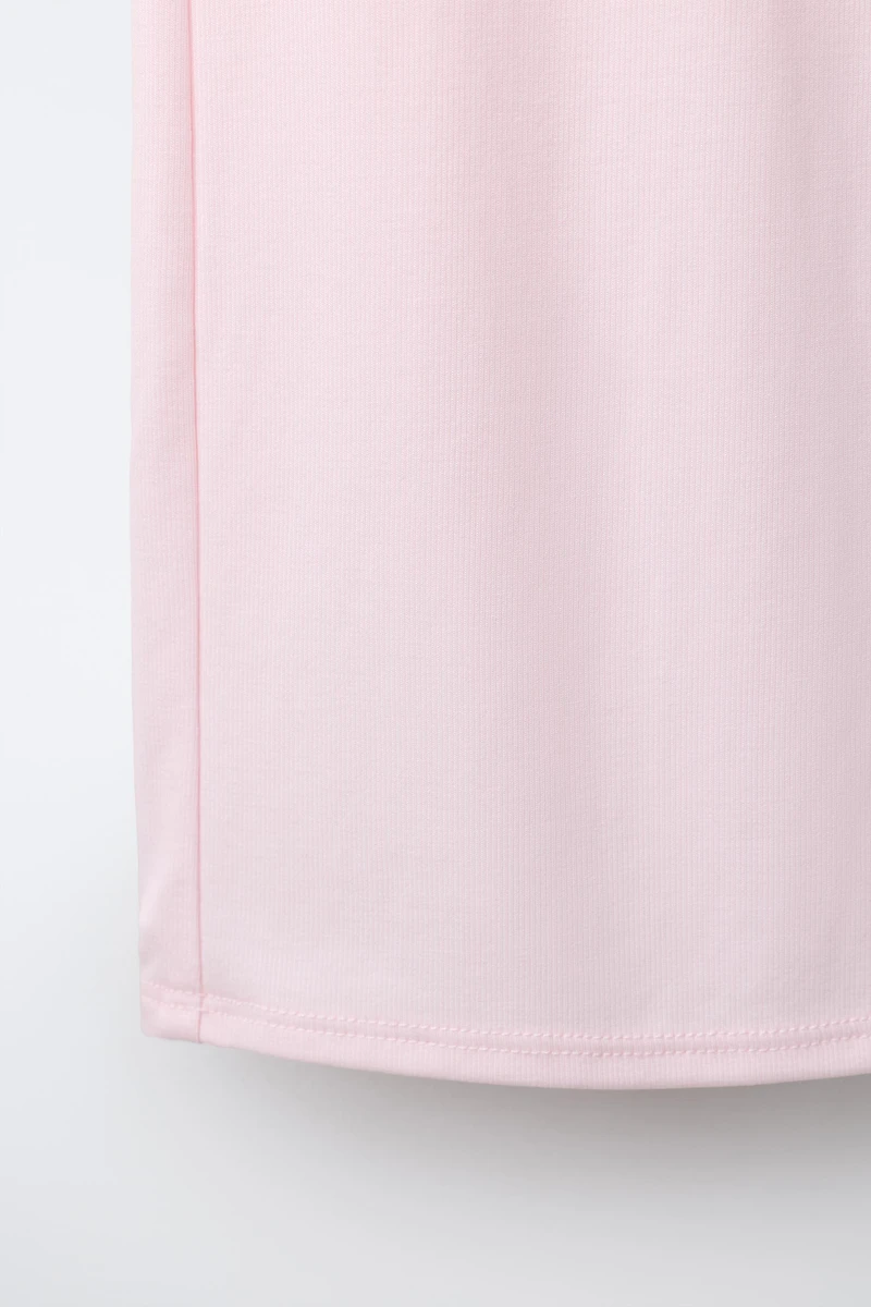PANTALON FLARE AVEC REVERS ET PLIS