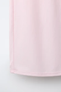PANTALON FLARE AVEC REVERS ET PLIS