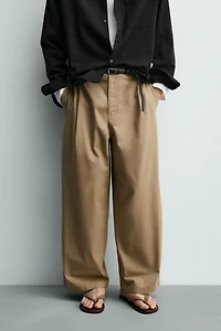PANTALON COUPE LARGE À PLIS