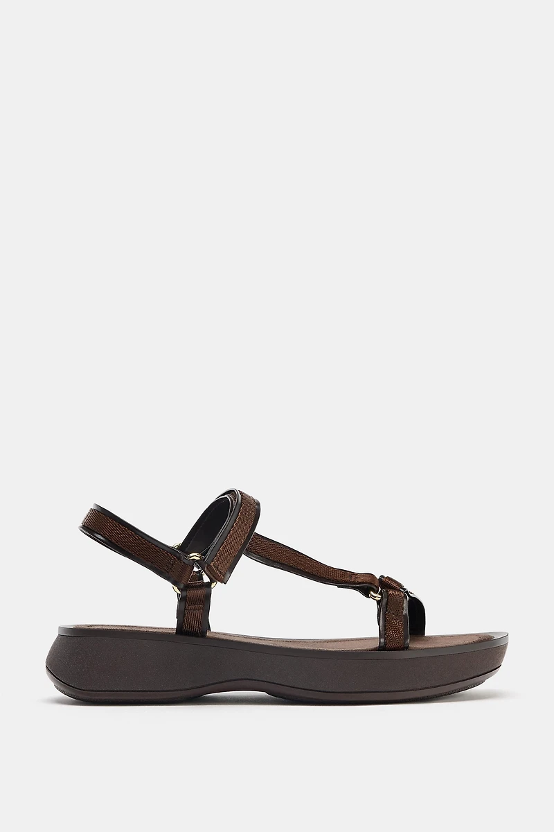 STRAPPY ADHESIVE SANDALS