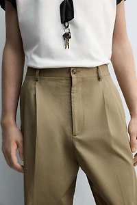 LIMITED EDITION RELAXED FIT PLEATED PANTS