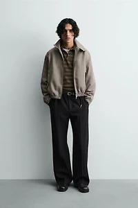 BLOUSON COURT COUPE STRUCTURÉE À CHEVRONS