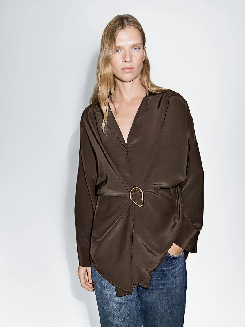 Long shirt with brooch detail