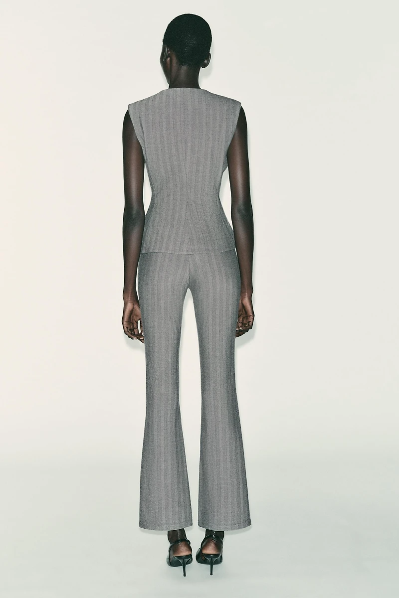 GILET CHEVRON ÉVASÉ