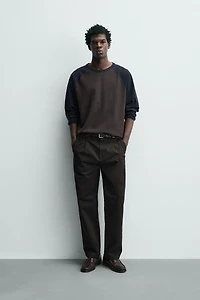 RELAXED FIT PLEATED PANTS
