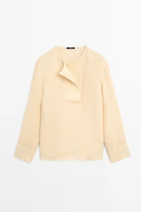 Flowing linen blouse with chest detail