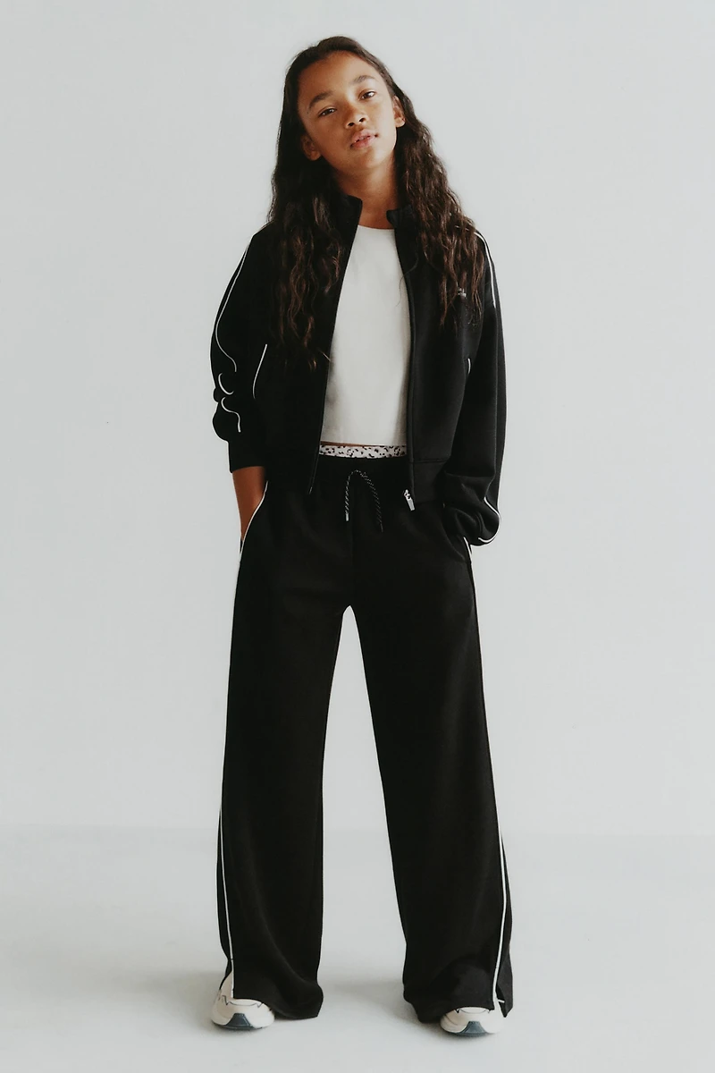 MODAL PANTS WITH CONTRASTING PIPING