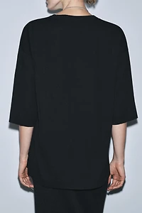 TOP EN MAILLE OVERSIZE