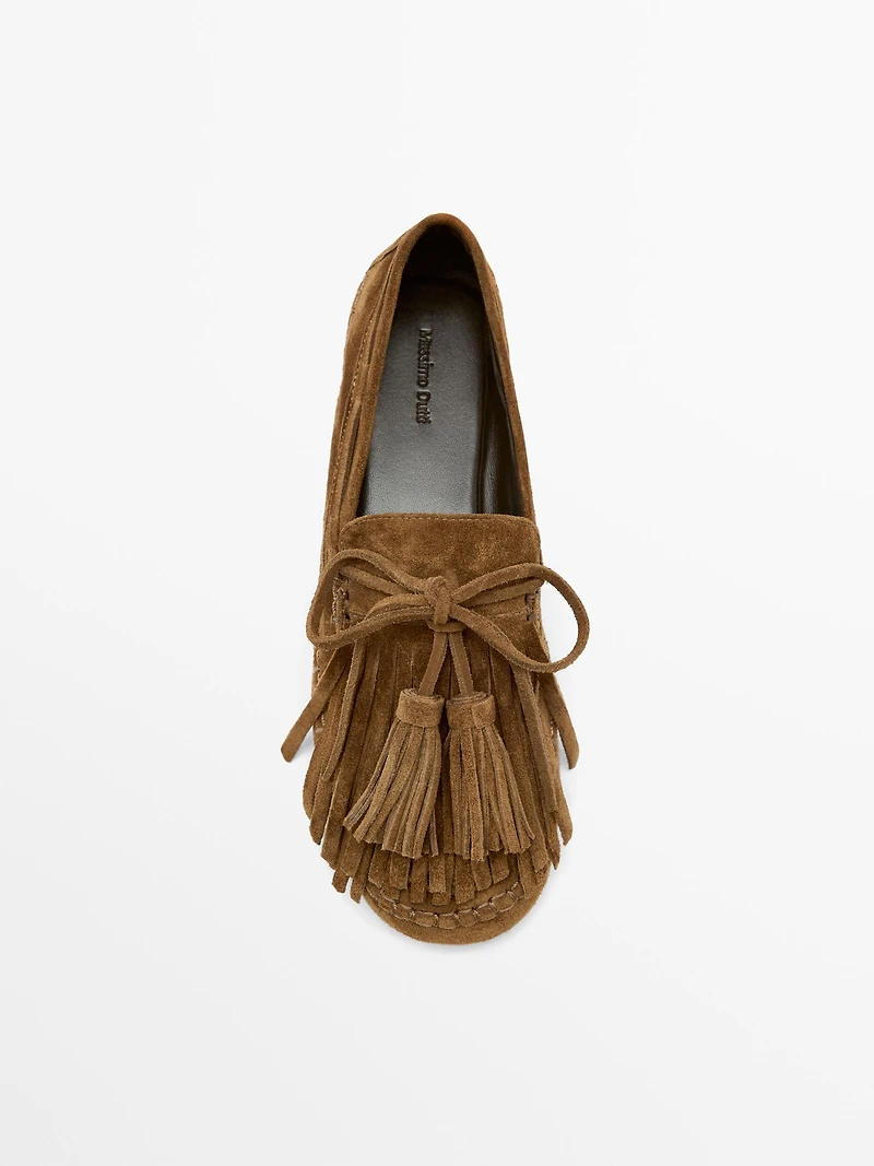 Split suede loafers with fringing and tassels