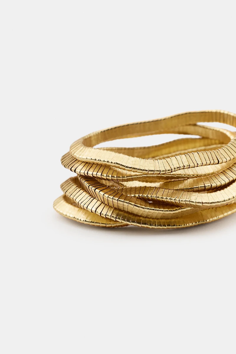 PACK OF ELASTIC BRACELETS WITH METAL PIECES