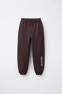 ENSEMBLE SWEAT ZIPPÉ ET PANTALON DE JOG AVEC ÉTIQUETTES