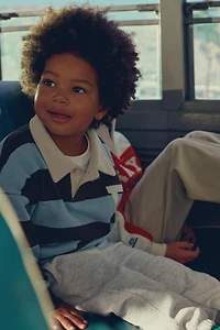 POLO RAYÉ BRODÉ