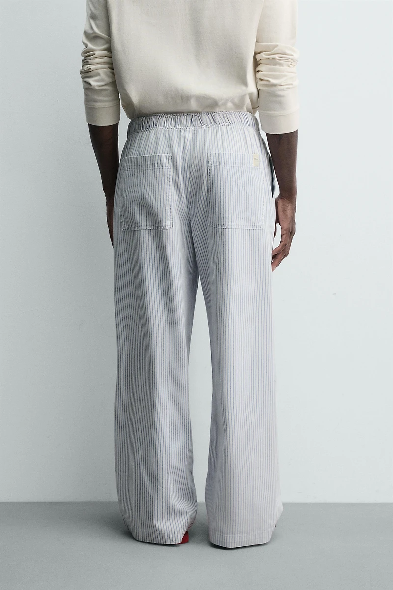 STRIPED BAGGY FIT PANTS