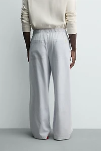 STRIPED BAGGY FIT PANTS