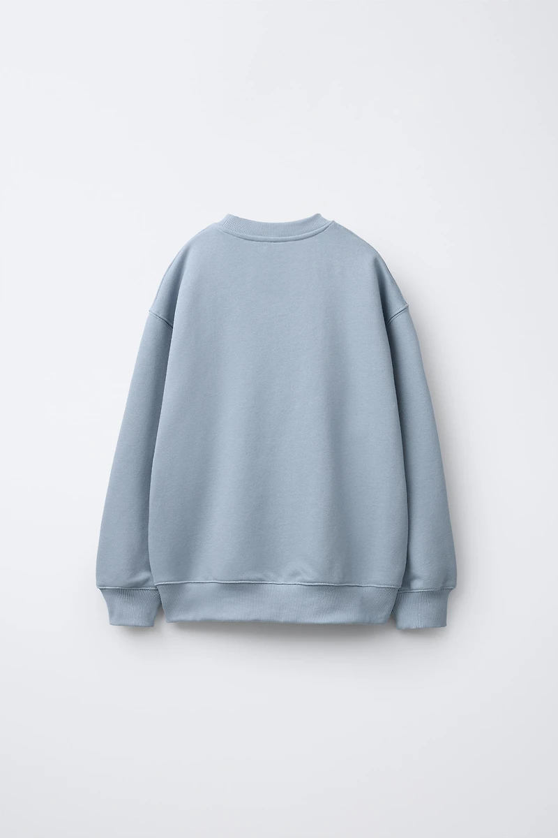 FLOCKED TEXT SWEATSHIRT