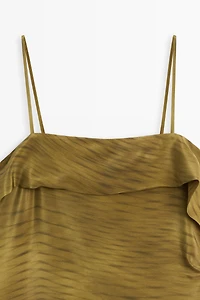 Asymmetric strappy top with draped detail