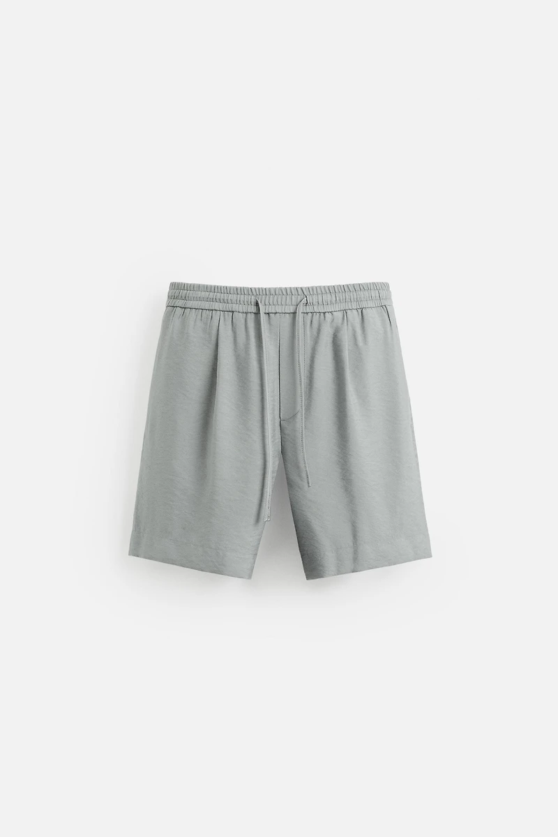 FLOWY RELAXED FIT BERMUDA SHORTS