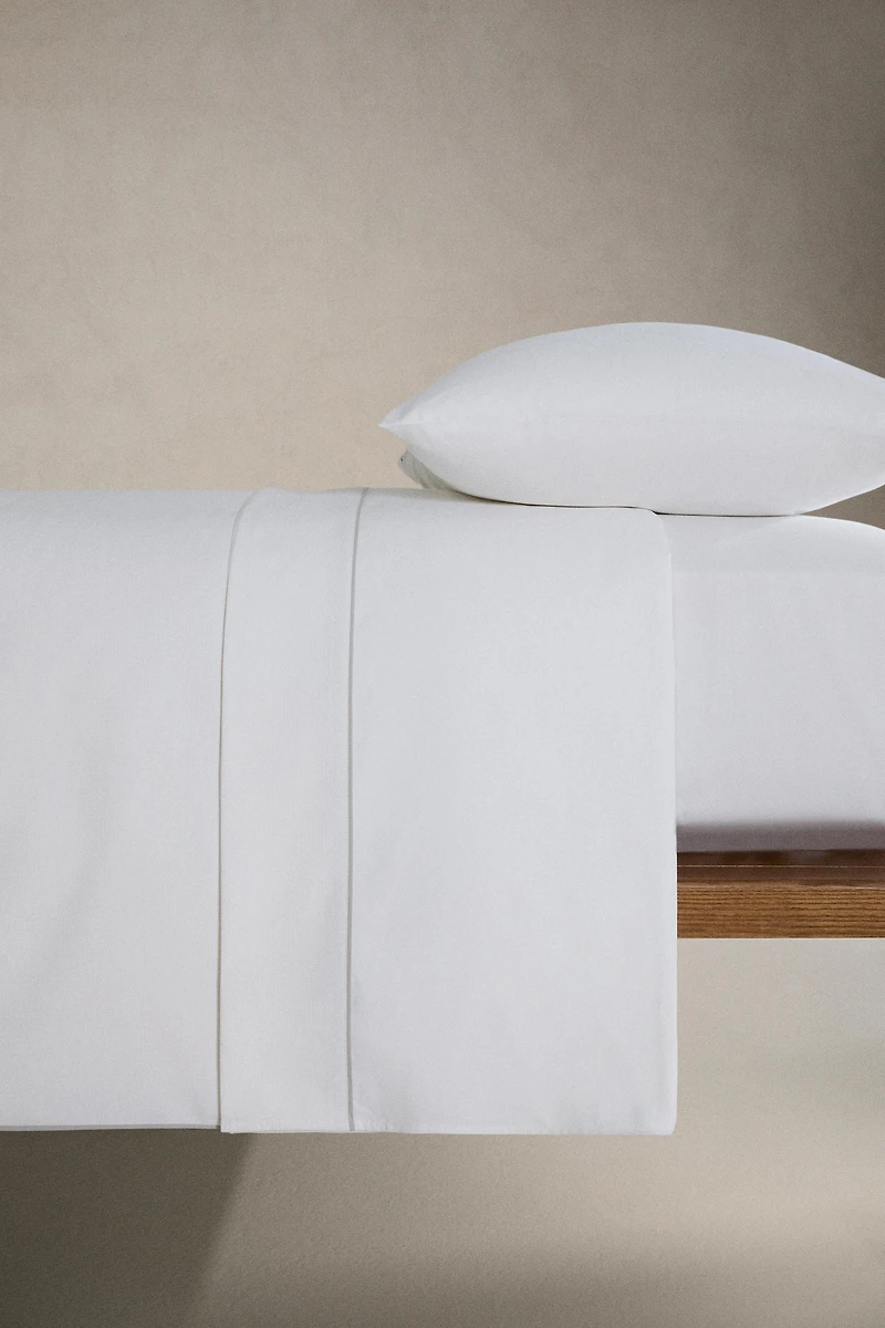 DRAP DE DESSUS PIQUÉ PASSEPOIL