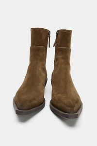 BOTTINES EN CUIR EFFET USÉ