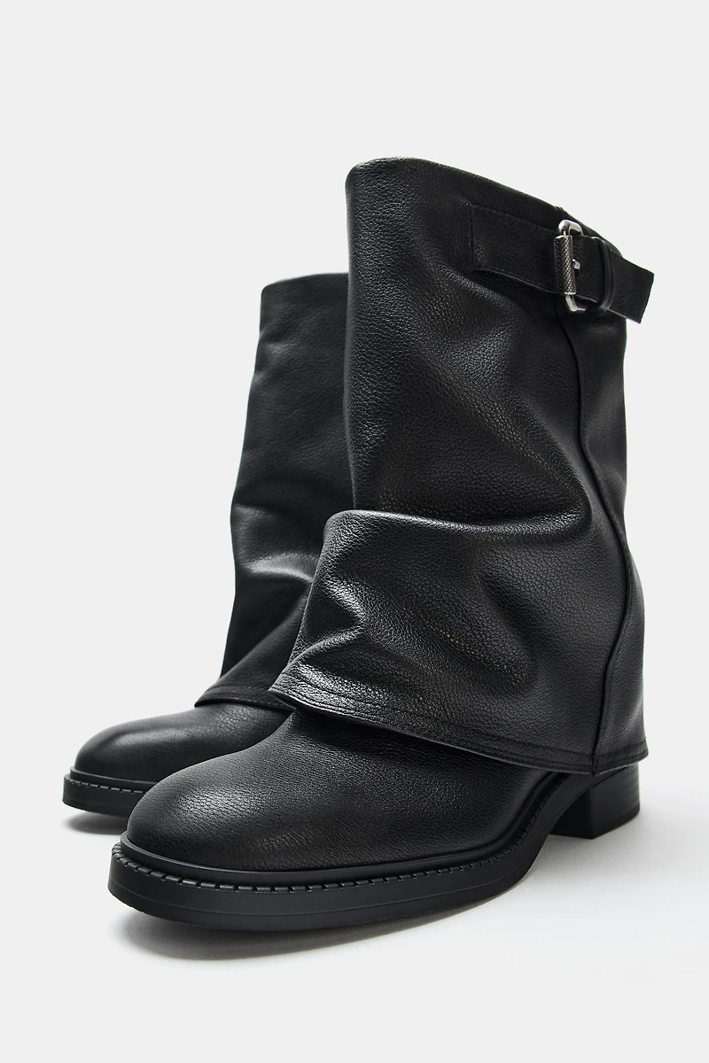 BOTTINES EN CUIR À BOUCLE