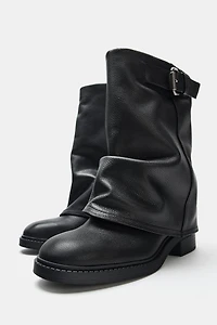 BOTTINES EN CUIR À BOUCLE