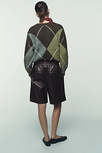 SHORT MATIÈRE SYNTHÉTIQUE