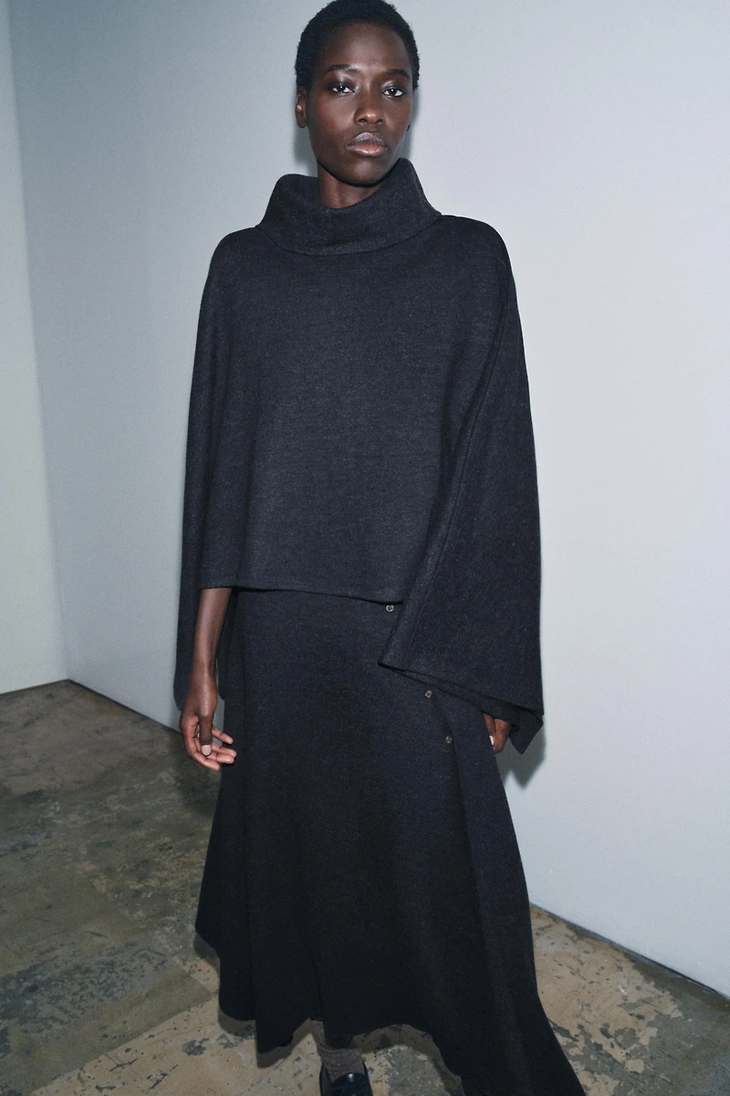 ASYMMETRIC SOFT CAPE