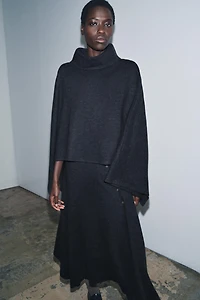 ASYMMETRIC SOFT CAPE