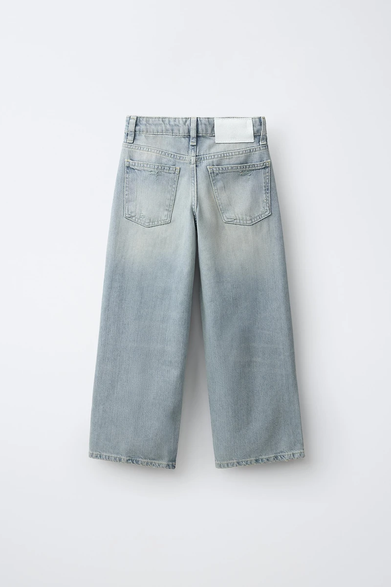 PANTALON WIDE LEG À DÉCHIRURES