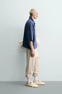 EMBROIDERED TEXT BOXY FIT POLO SHIRT