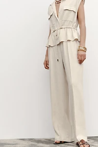 LINEN TWO-PIECE EFFECT JUMPSUIT