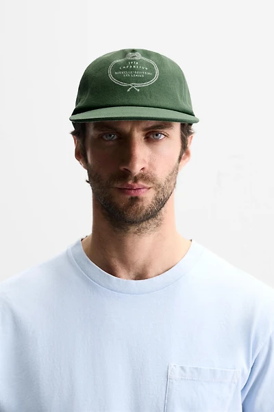 CASQUETTE DÉLAVÉE AVEC IMPRIMÉ COMBINÉ