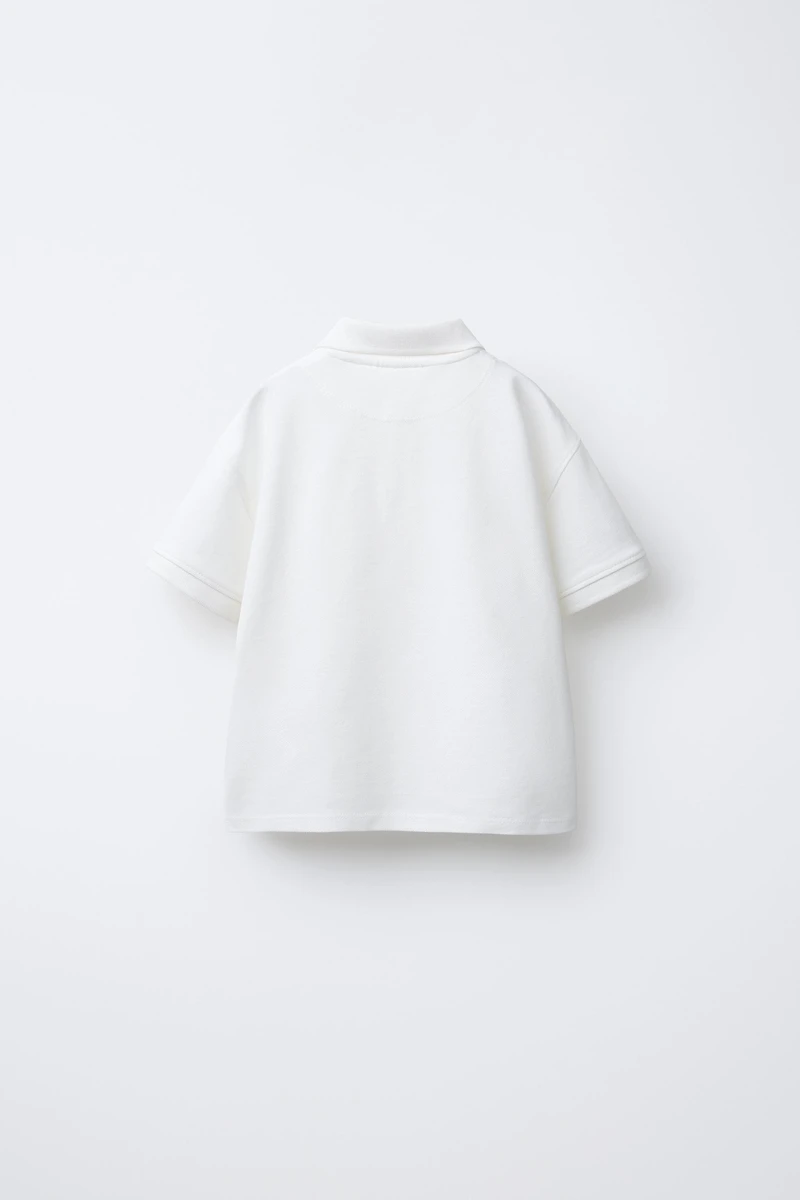 POLO BRODÉ PALMIER