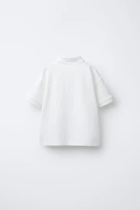 POLO BRODÉ PALMIER